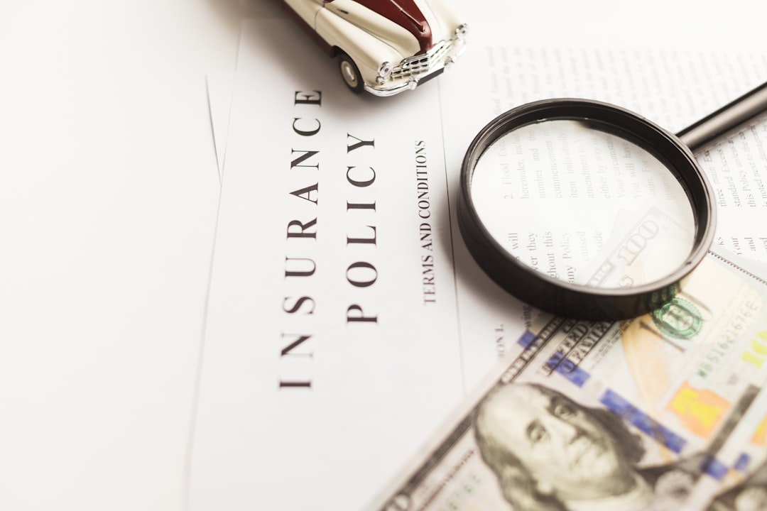 gallery-06 Certificate of motor insurance and policy with car and dollar bills.